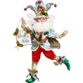 Decorative elf figurine with a 'Deck the Halls' sign on a white background
