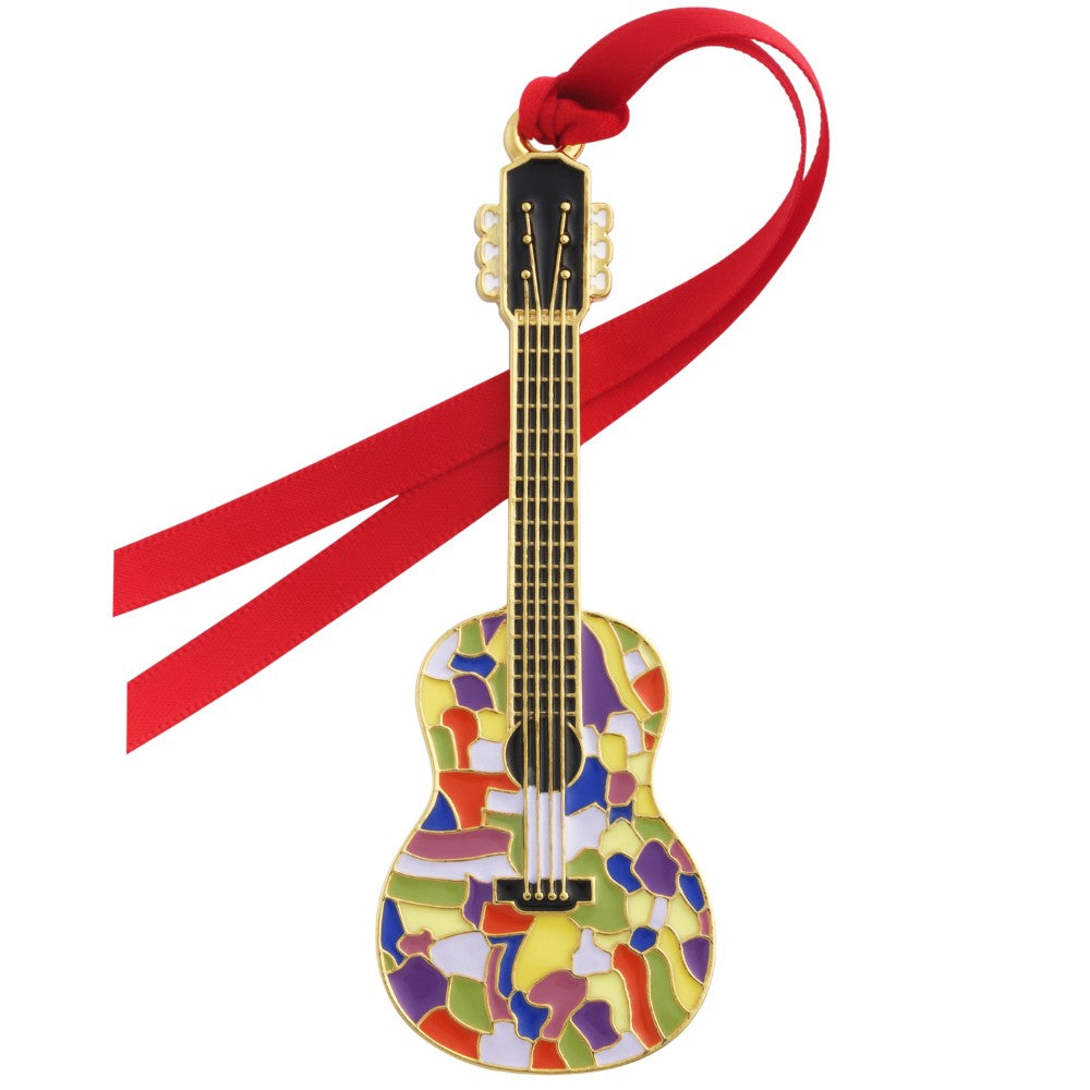A guitar-shaped ornament with a multicolor mosaic pattern on the body, a black neck, gold-toned headstock and fretboard, and a red hanging ribbon.