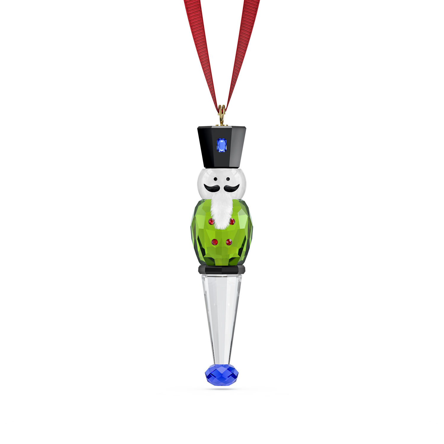A Swarovski Christmas ornament shaped like a nutcracker, featuring a green body, black top hat, white face, and a silver cone base ending in a blue faceted crystal, suspended from a red ribbon on a white background.