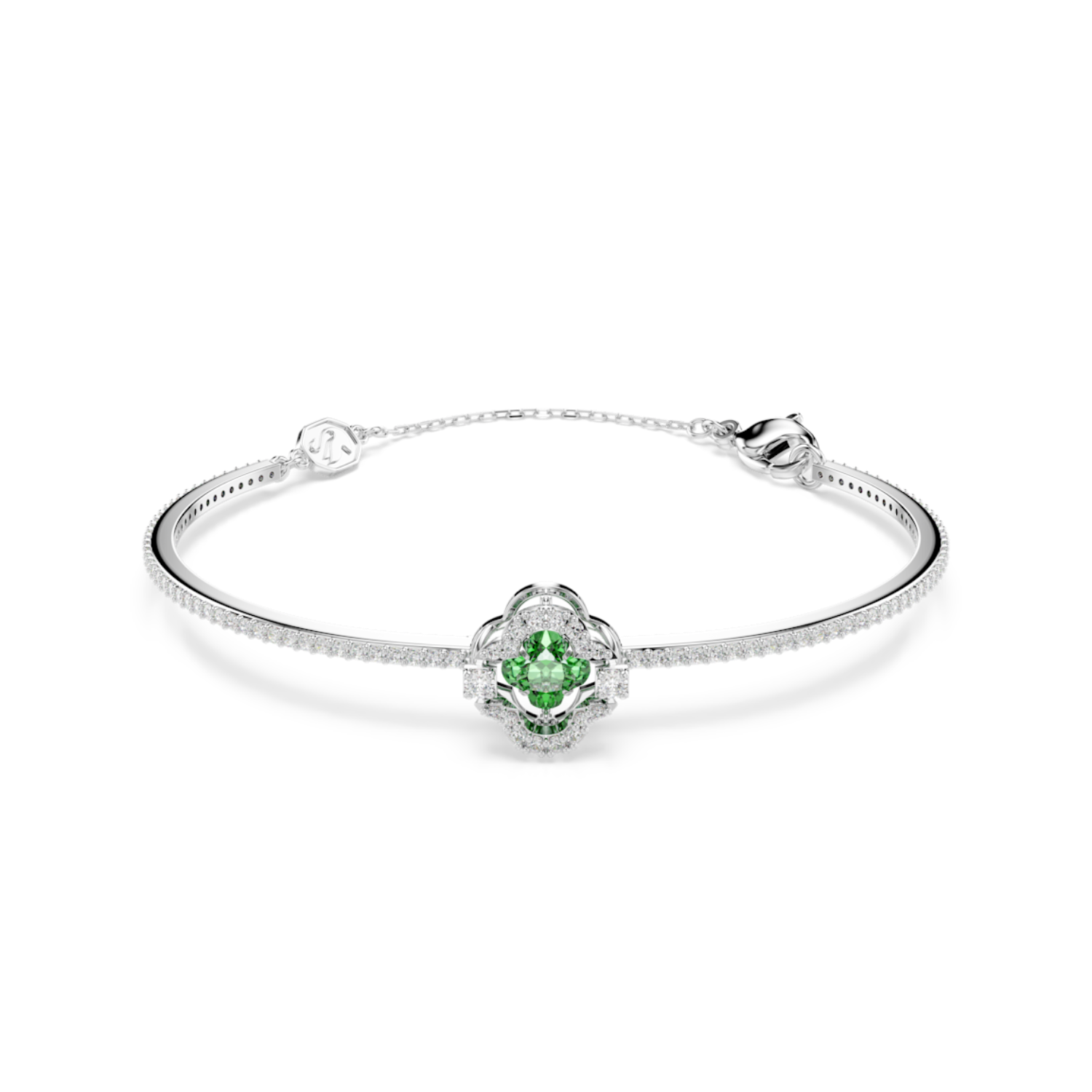 A silver bangle bracelet featuring a central floral cluster with a vibrant green heart-shaped gemstone surrounded by small clear stones, set against a plain white background.