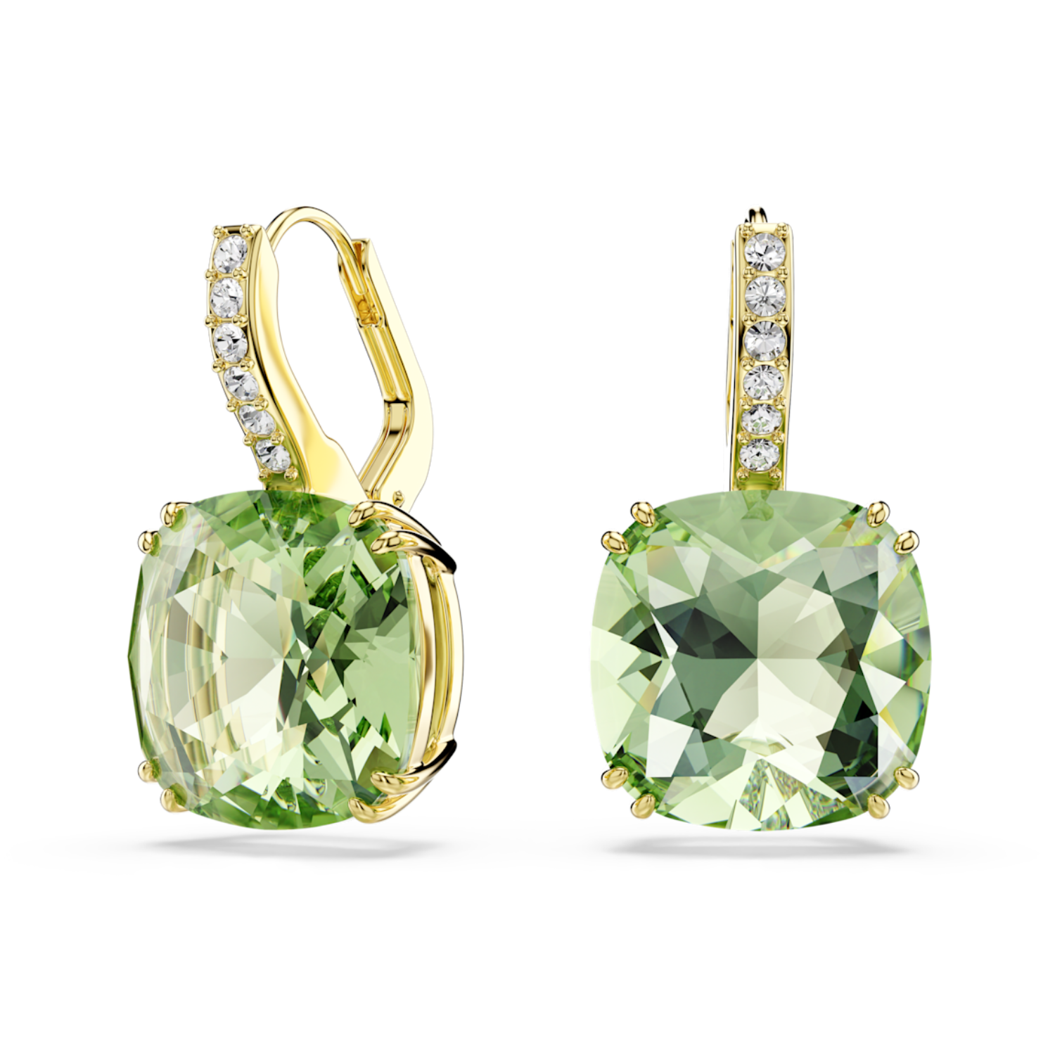 Gold earrings with green gemstones on a white background