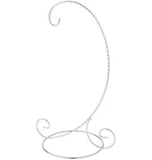 Decorative metal stand with a curved design on a white background