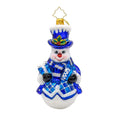 Decorative snowman ornament with blue plaid pattern and top hat on a white background