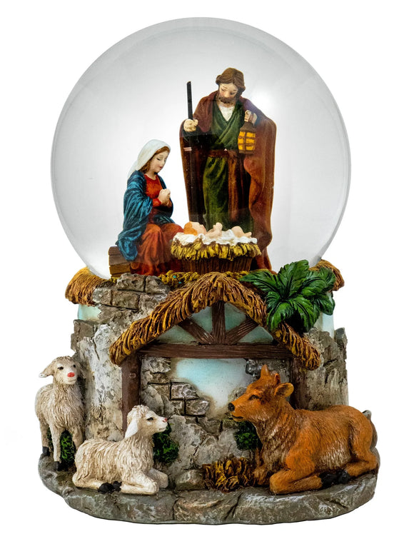 Nativity scene snow globe with figures of Mary, Joseph, and baby Jesus, surrounded by animals.