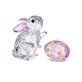 Crystal rabbit figurine with pink bow and crystal-embellished pink egg on a white background