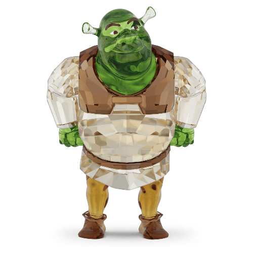 Toy figure of a green character with a brown outfit on a white background