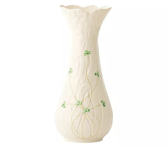 White vase with green floral patterns on a white background